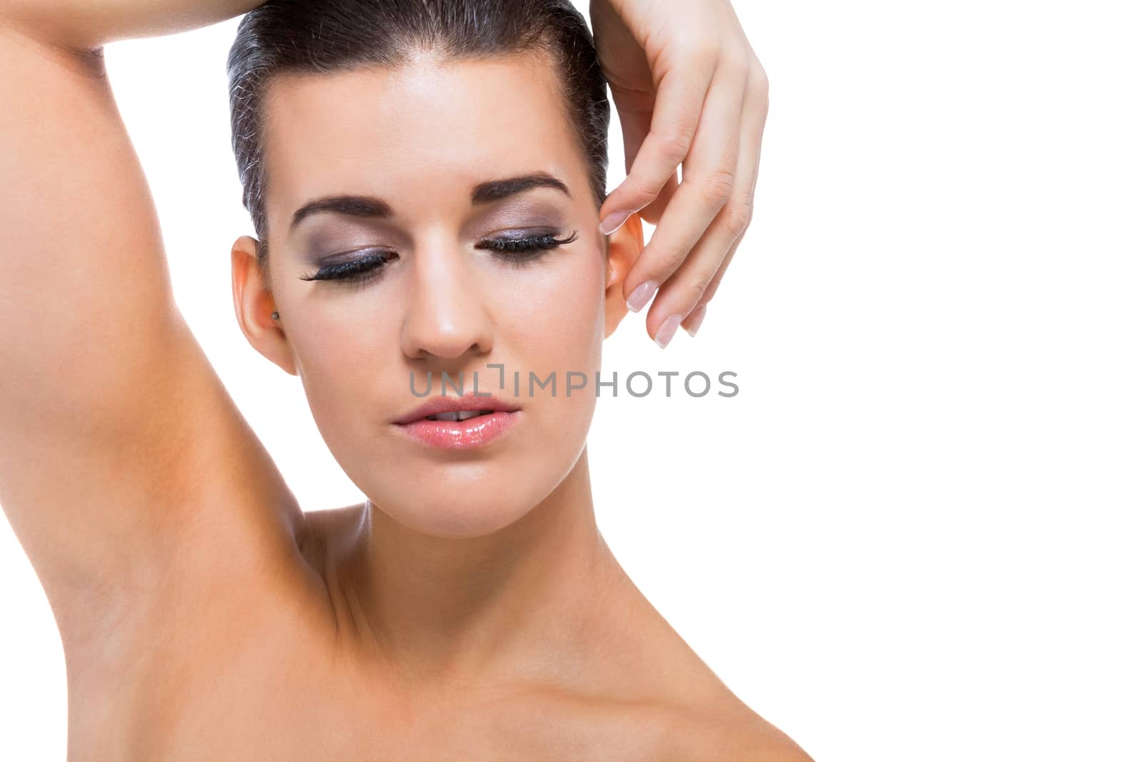 beautiful young woman with perfect skin and soft makeup isolated 