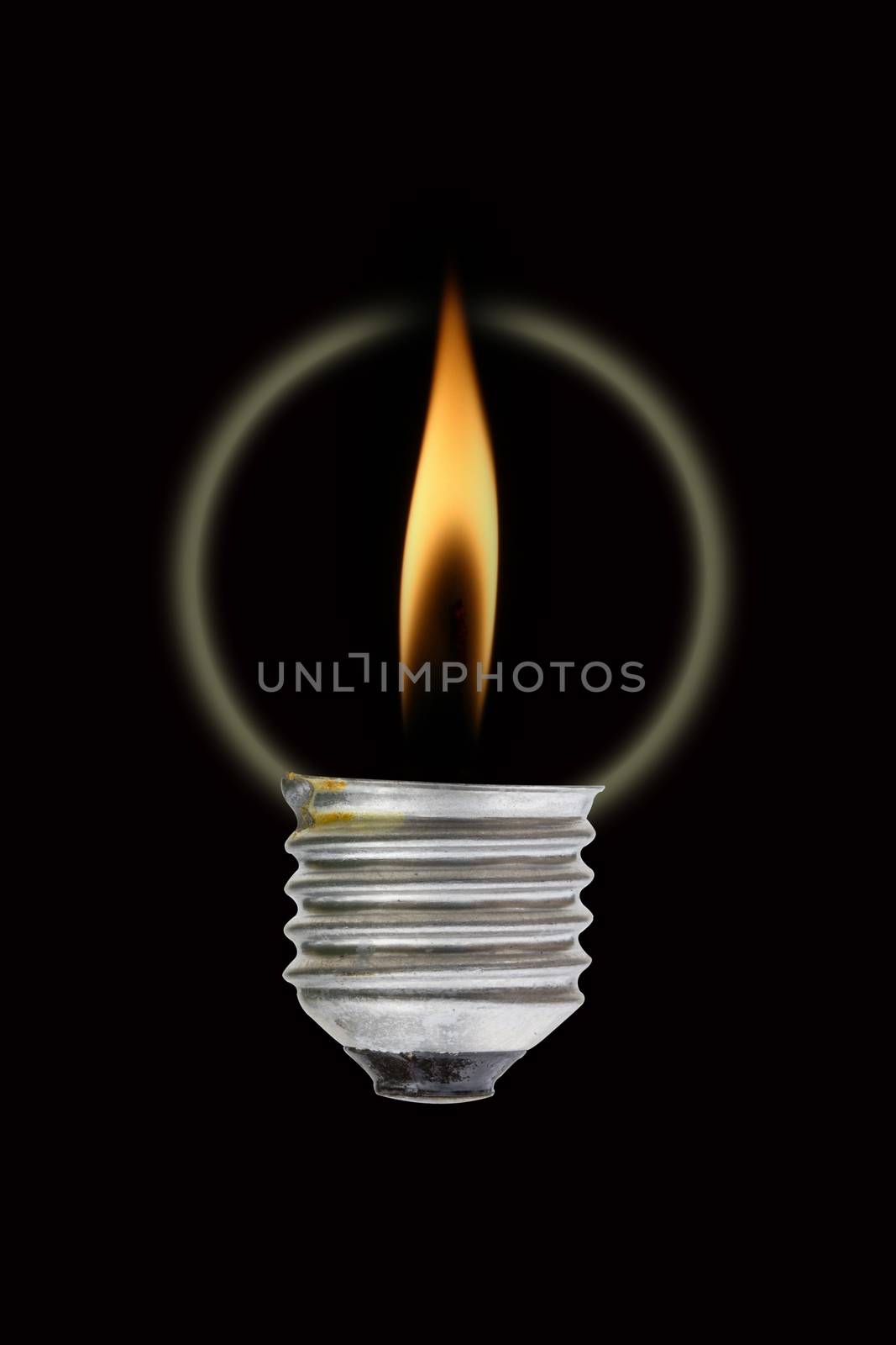 Fire and smoke in side the light bulb. Concept for energy consumption and environmental awareness