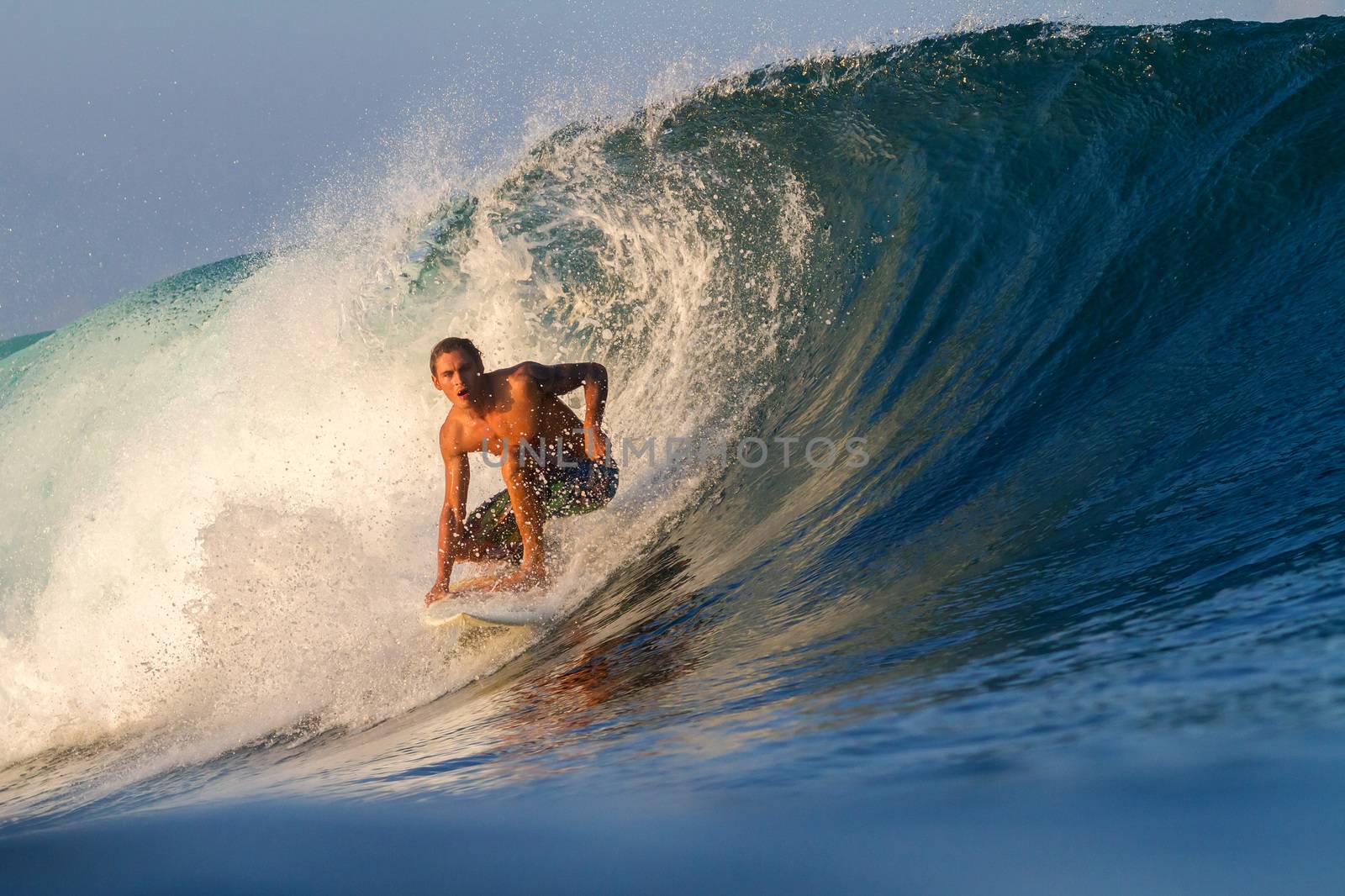 Picture of Surfing a Wave.Sumbawa Island. Indonesia.