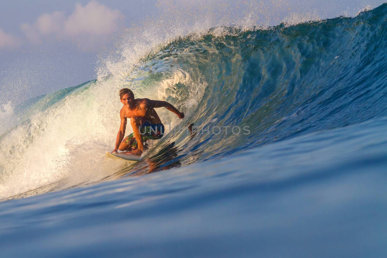 Picture of Surfing a Wave.Sumbawa Island. Indonesia.