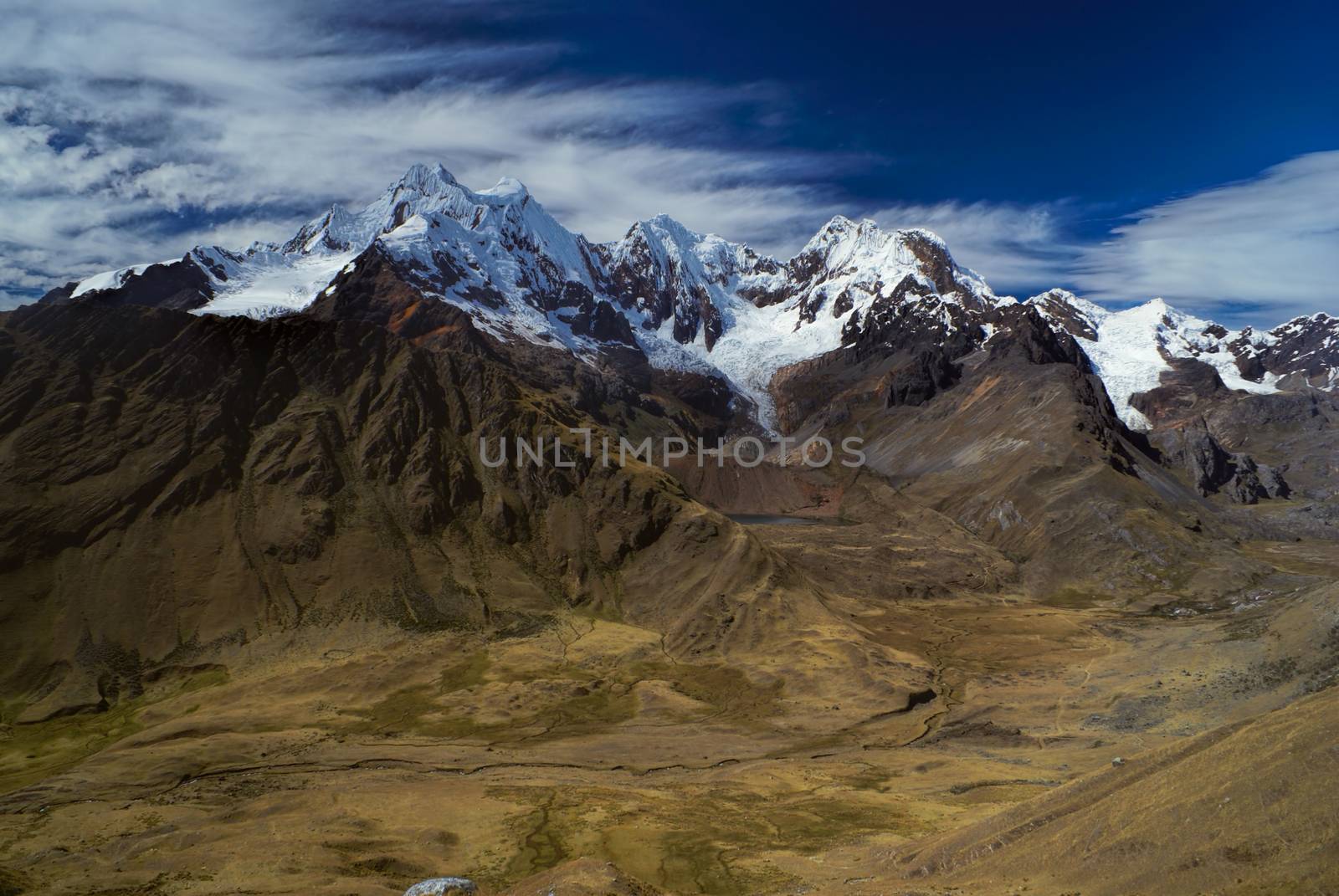 Breathtaking scenery around Alpamayo, one of highest mountain peaks in Peruvian Andes, Cordillera Blanca