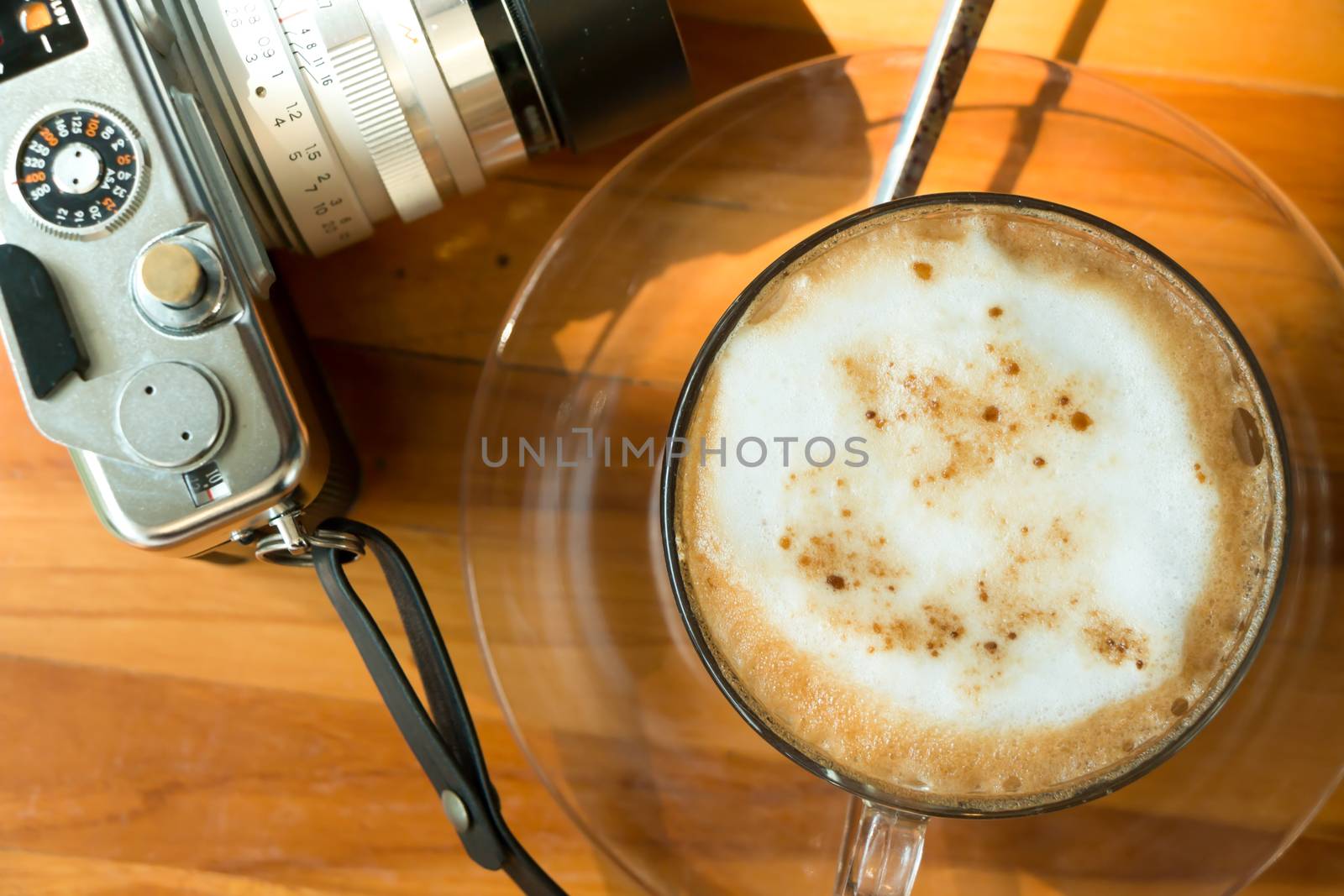 Coffee cup with film camera, vintage style