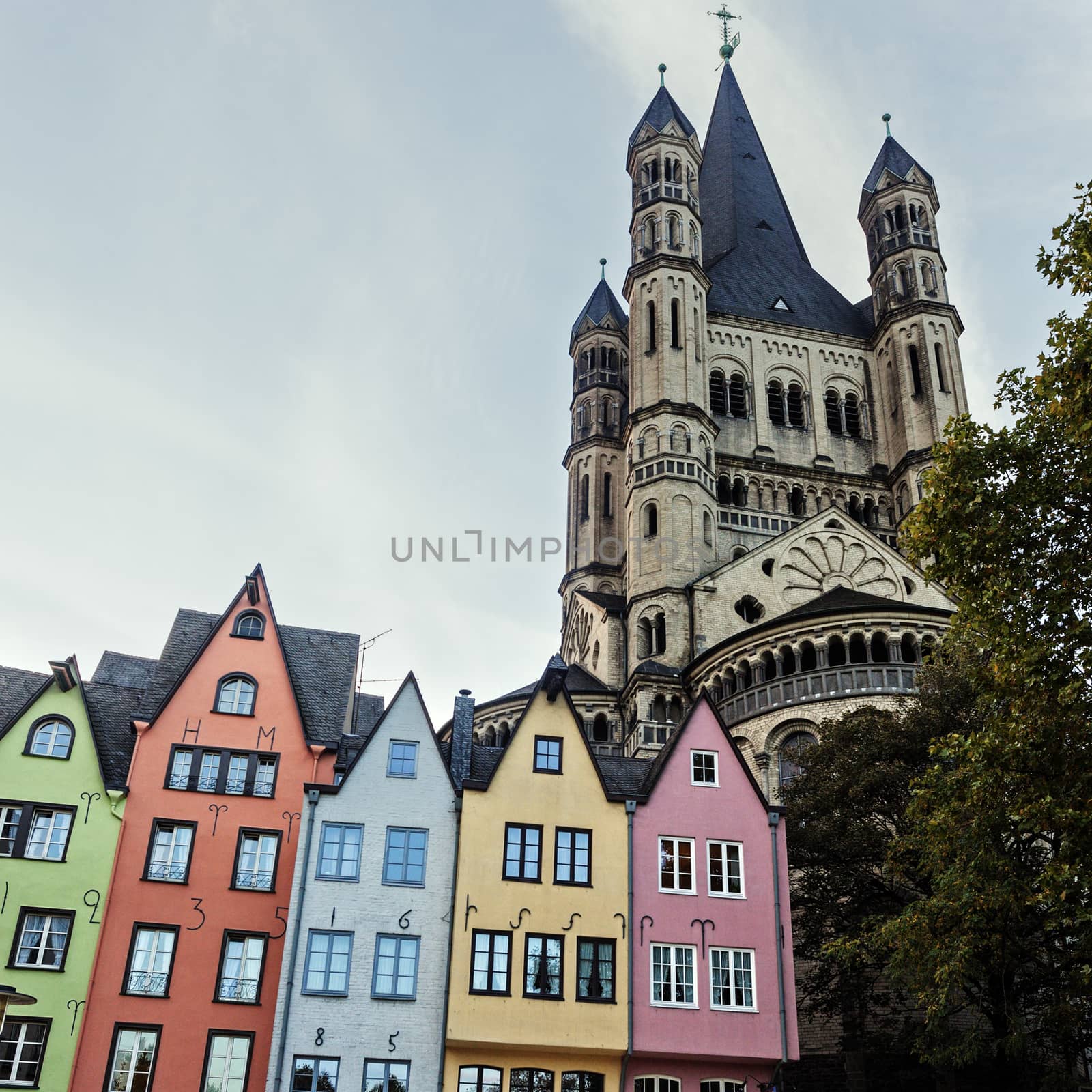 Great St. Martin Churchand and colorful houses of Cologne by benkrut