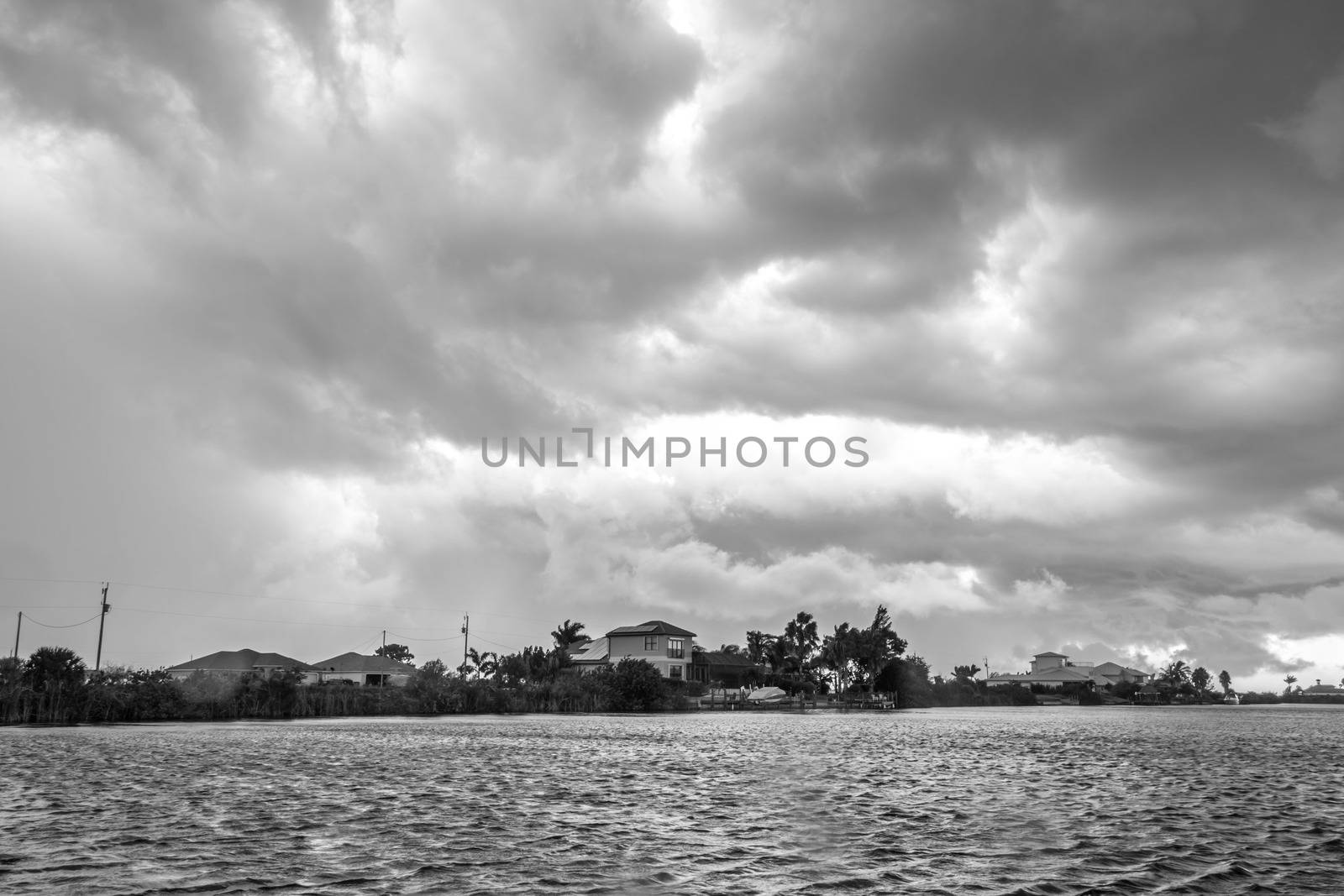 Dark clouds hovering over the water before a heavy storm in Cape Coral, Florida
