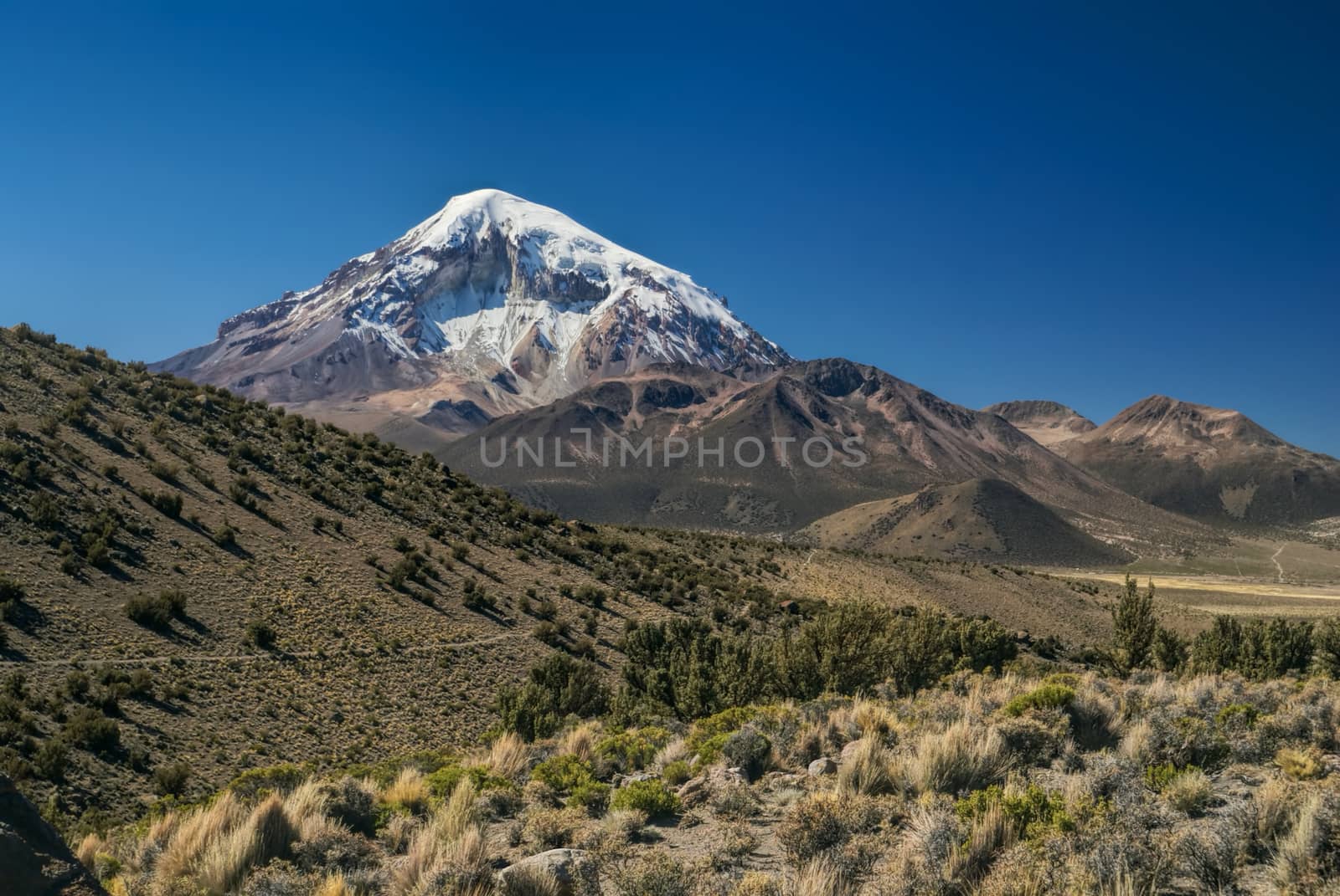 Picturesque view of Nevado Sajama volcano, highest peak in Bolivia in Sajama national park