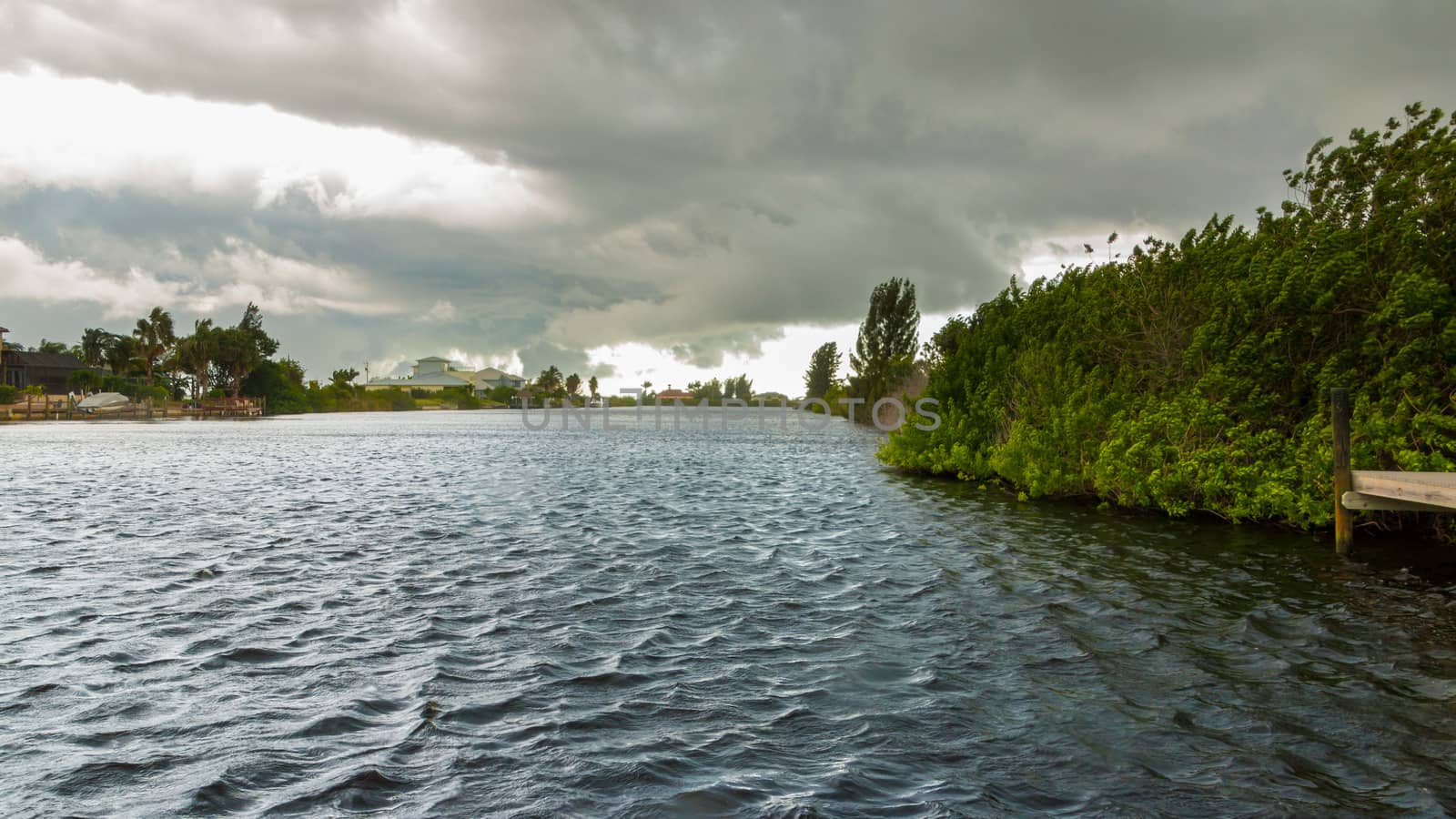 Dark clouds hovering over the water before a heavy storm in Cape Coral, Florida
