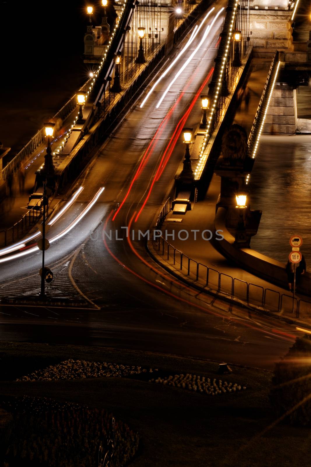 Public transport on the Suspension Bridge at night in Budapest
