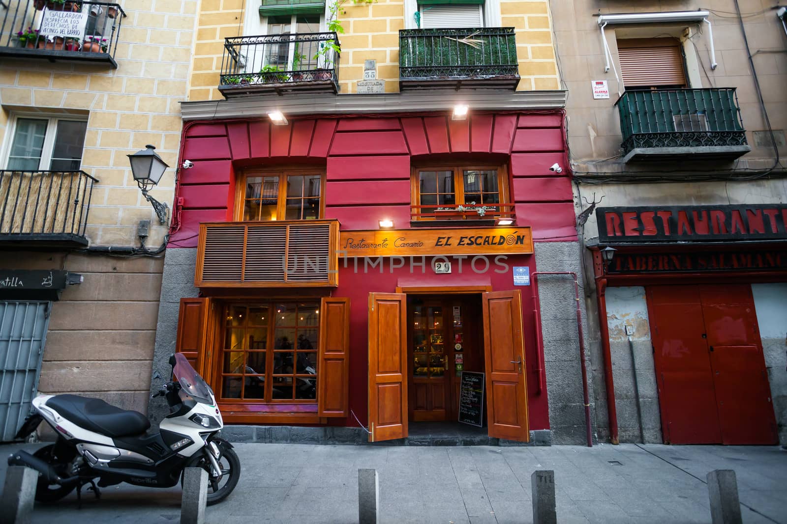 Madrid, Spain - May 6, 2012: Typical restaurant on a street of Madrid city, Spain
