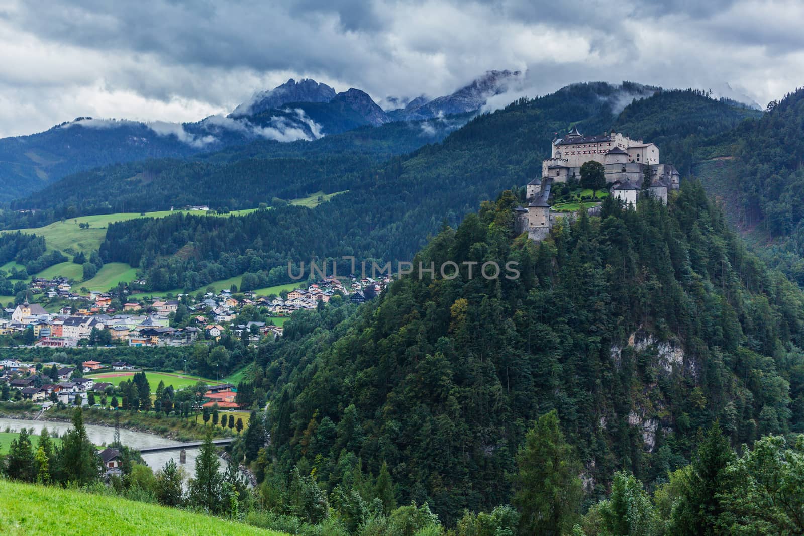 Castle Hohenwerfen by Salzburg on a misty mountain in the Alps