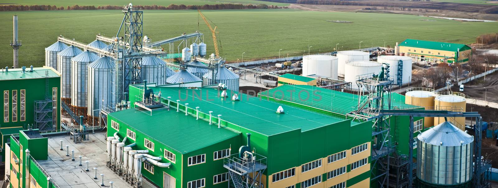 Towers of grain drying enterprise. metal grain facility with silos