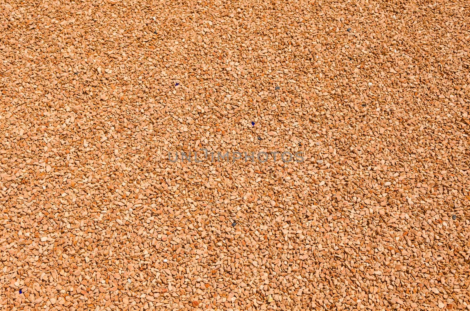 Brown small pebble as background image.
