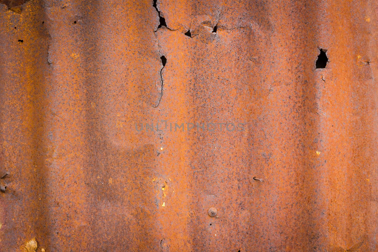 Rusted galvanized iron plate background.