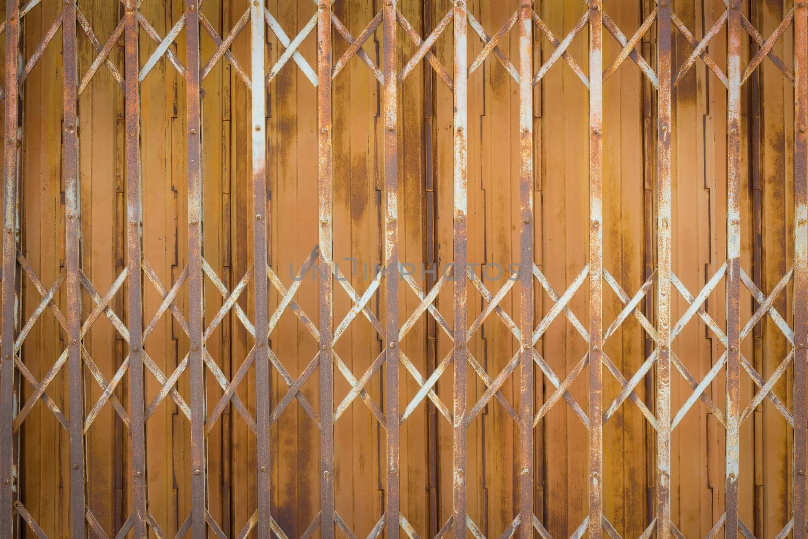 old and rusty iron door background.