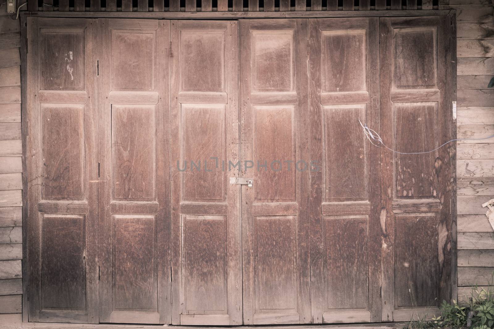 vintage wood door of thai style house