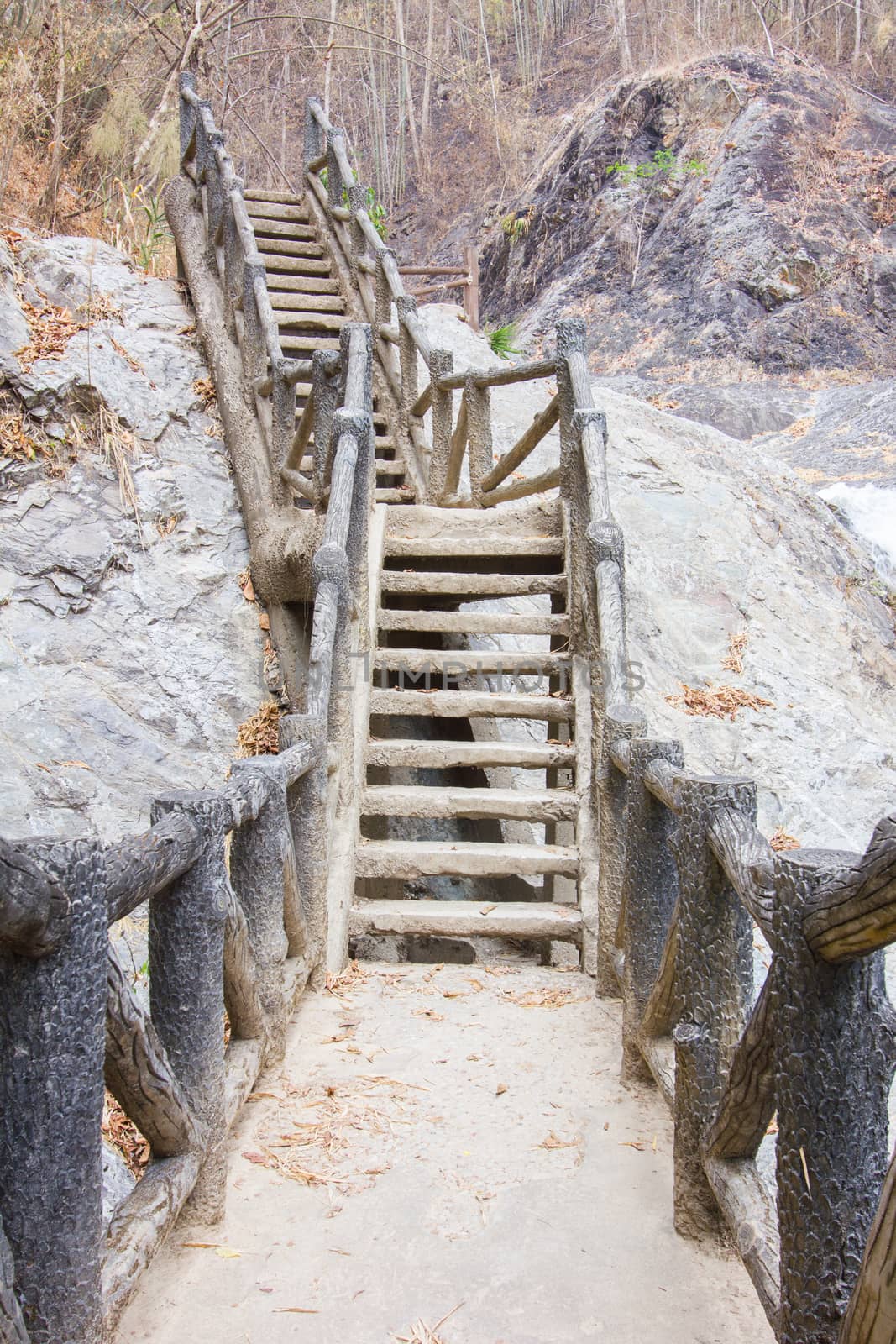 long outdoor cement steps by a3701027