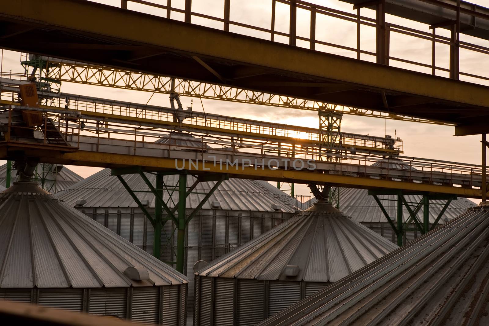 Towers of grain drying enterprise. metal grain facility with silos