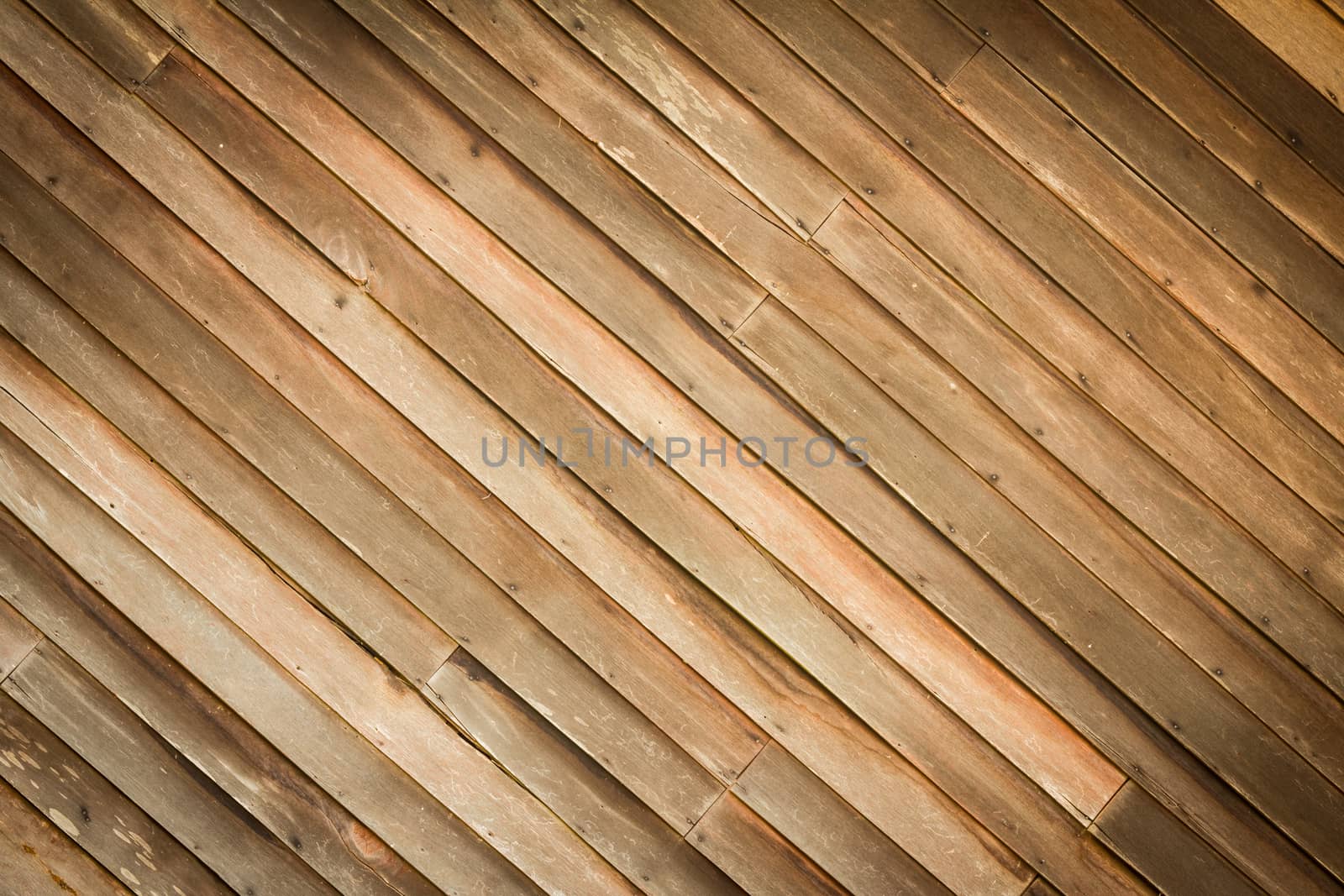 wooden background with weathered wood and rusty nails