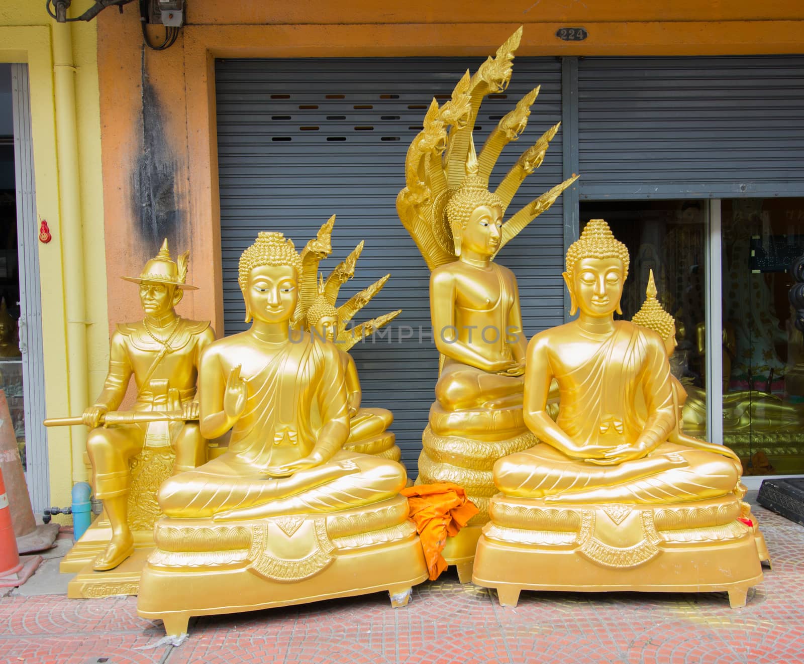 buddhas  for sale in front of the shop