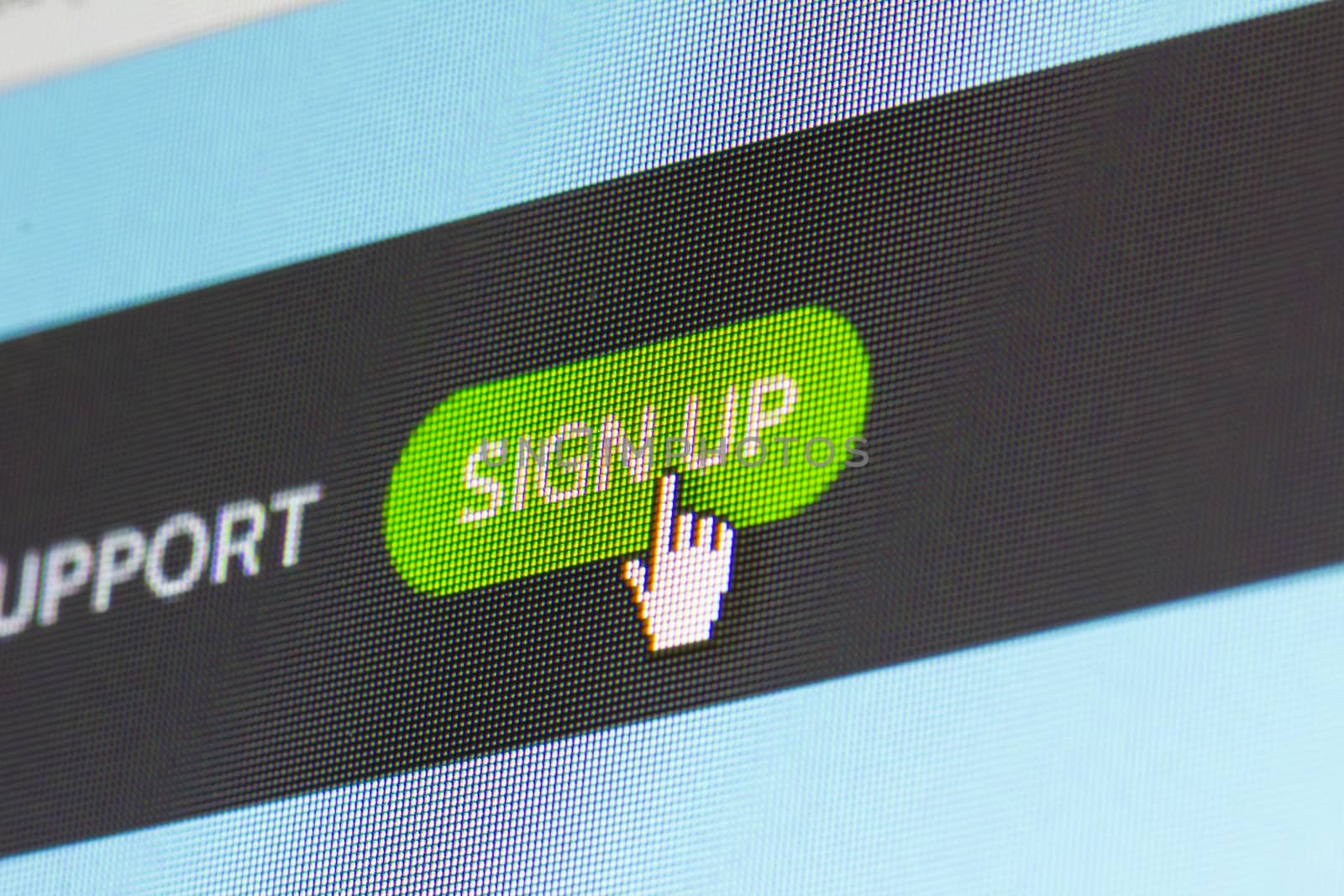 Closeup of Sign Up button on a LCD screen.