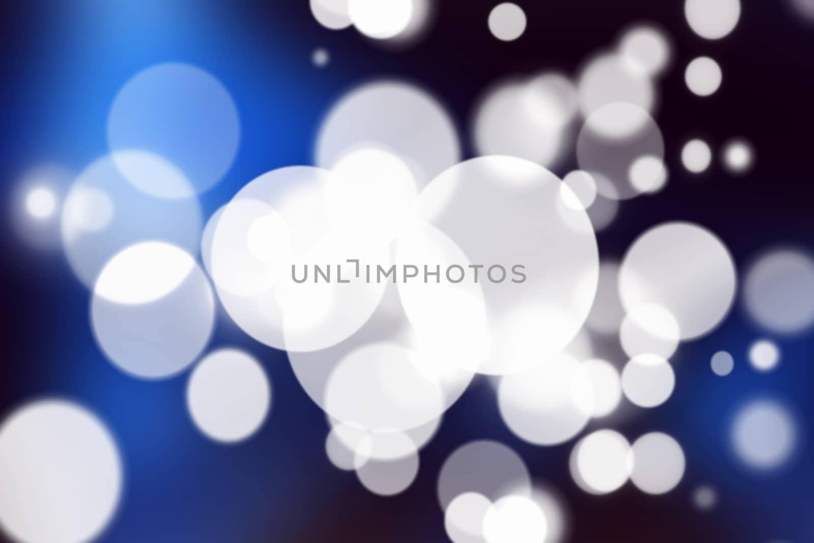 Blue bokeh abstract light background.