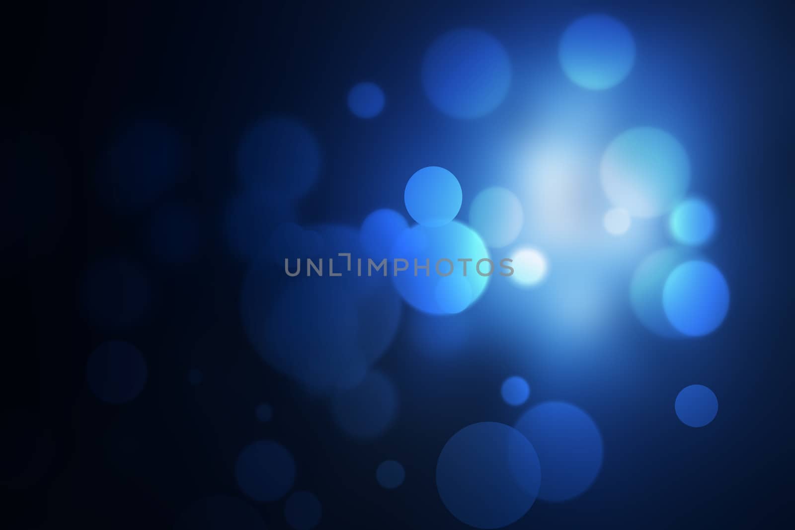 Blue bokeh abstract light background.