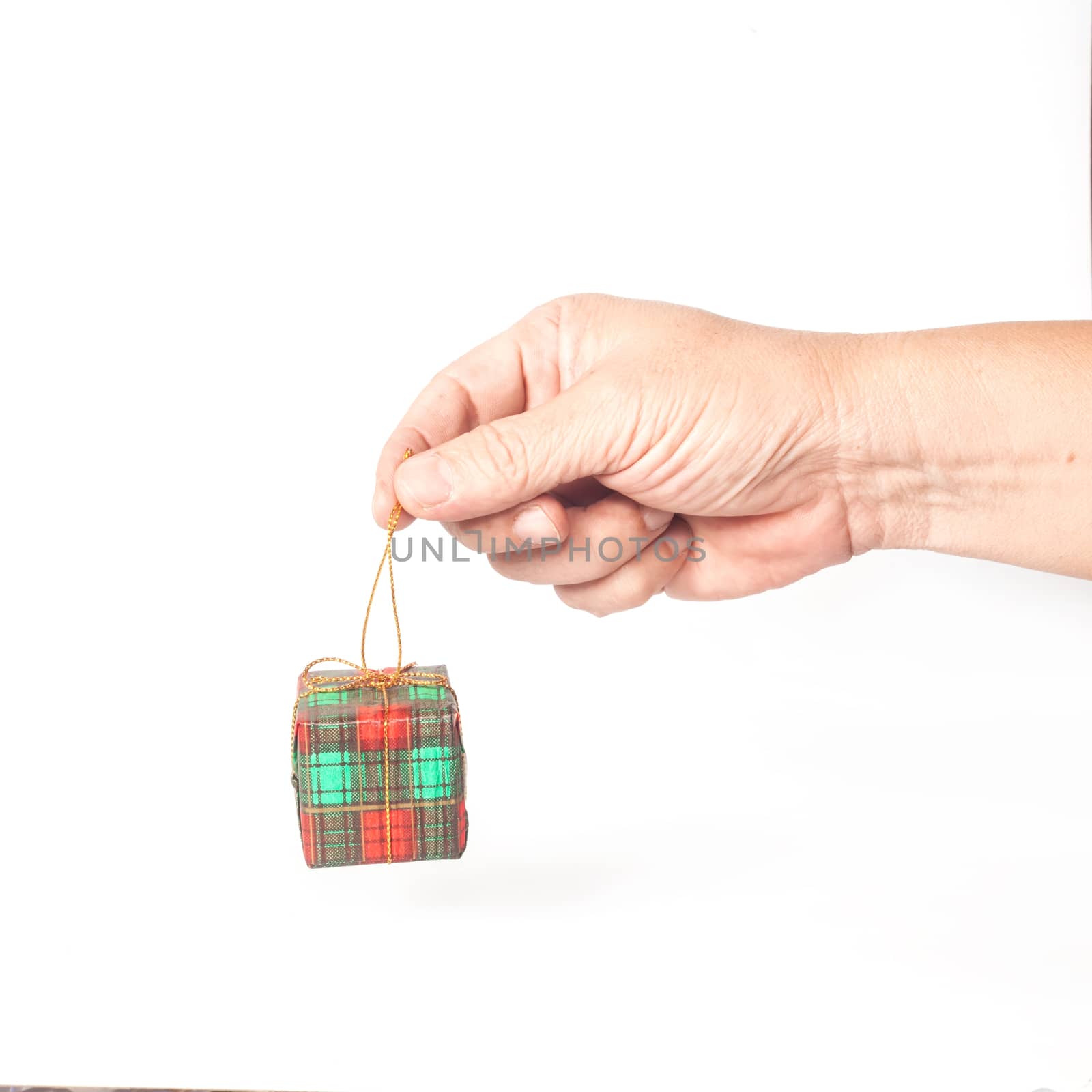 Gift box in hands. Isolated on white background.