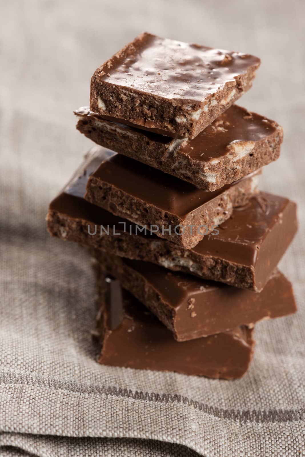 stack of chocolate up view by Nanisimova
