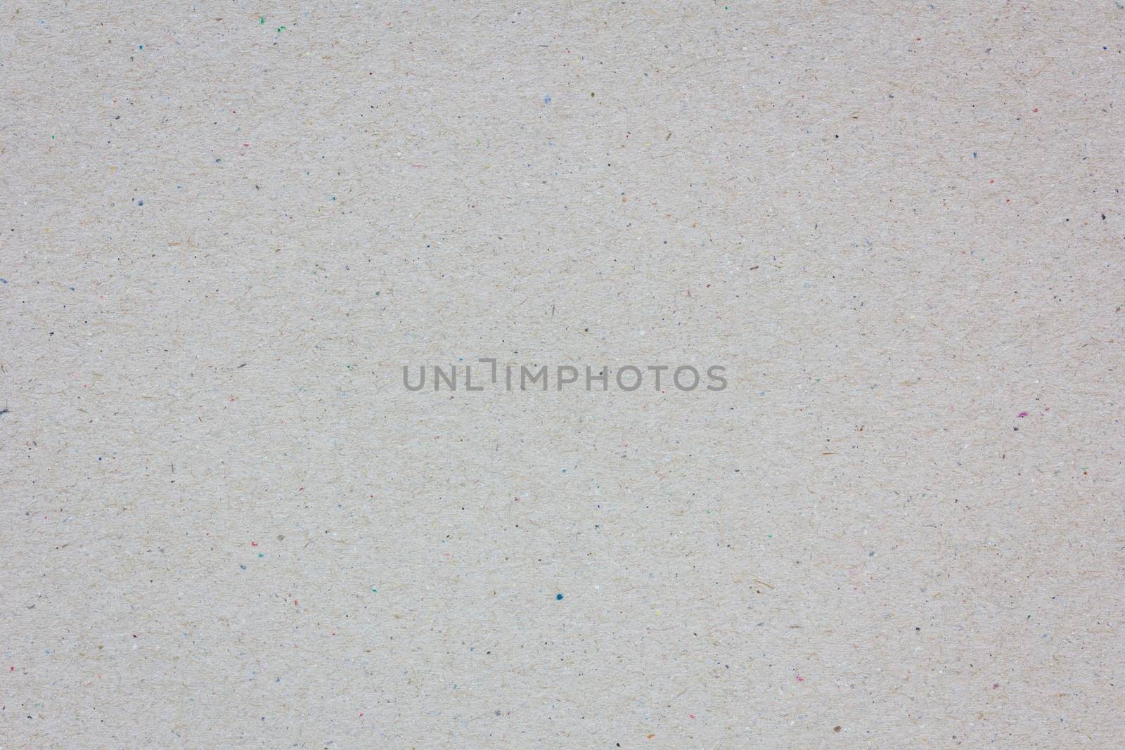 extreme closeup of a grey cardboard texture, background.