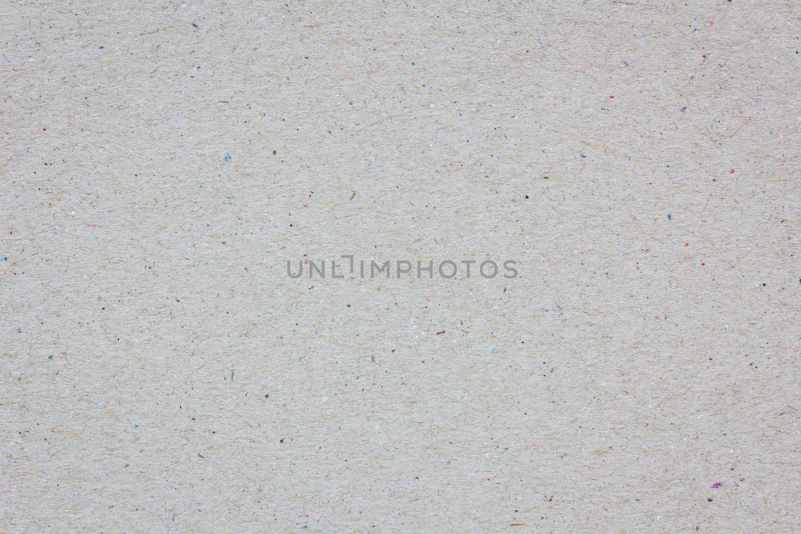 extreme closeup of a grey cardboard texture, background.