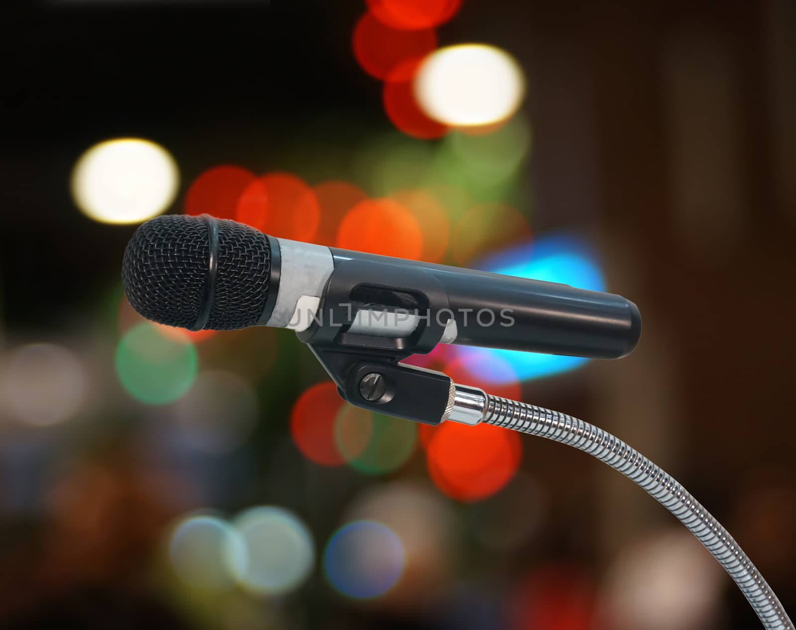 Single Microphone in the bokeh light 
background
