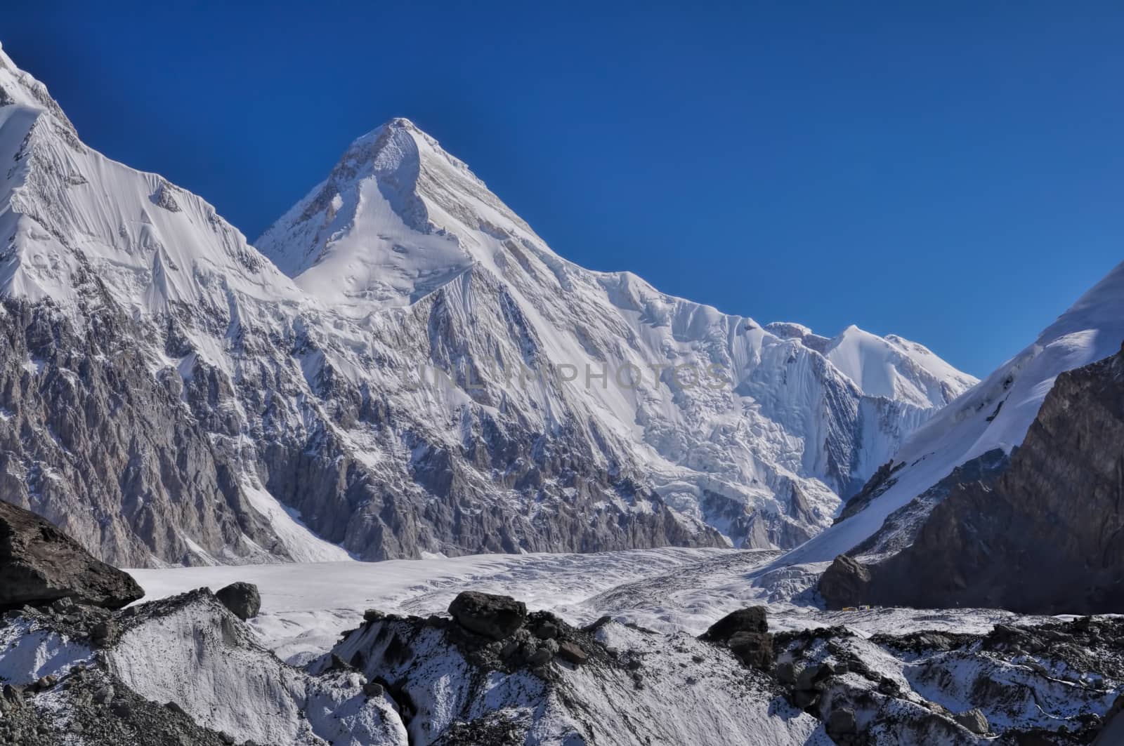 Picturesque view of Engilchek glacier with peaks of Tian Shan mountain range in Kyrgyzstan