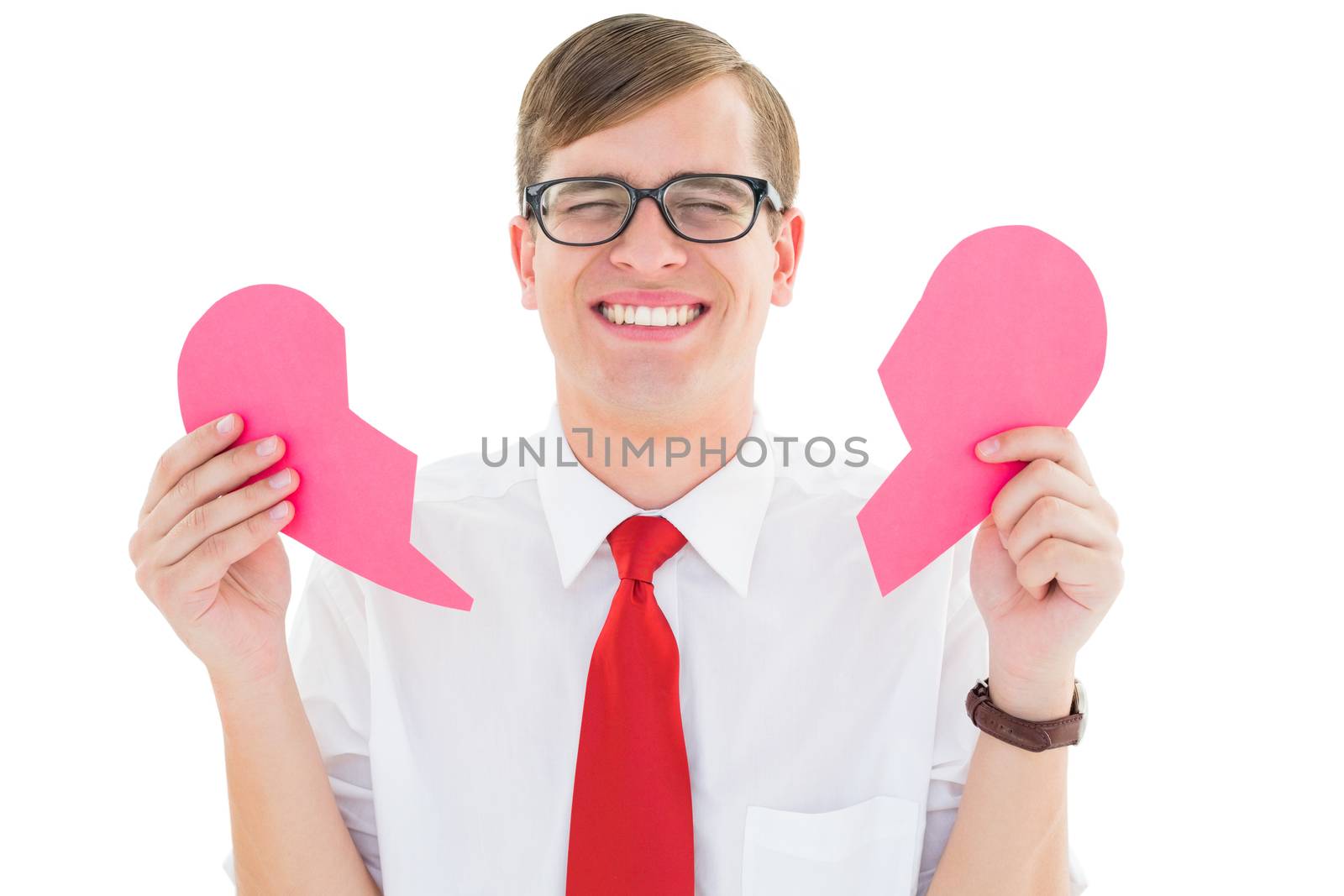 Geeky hipster holding a broken heart card on white background