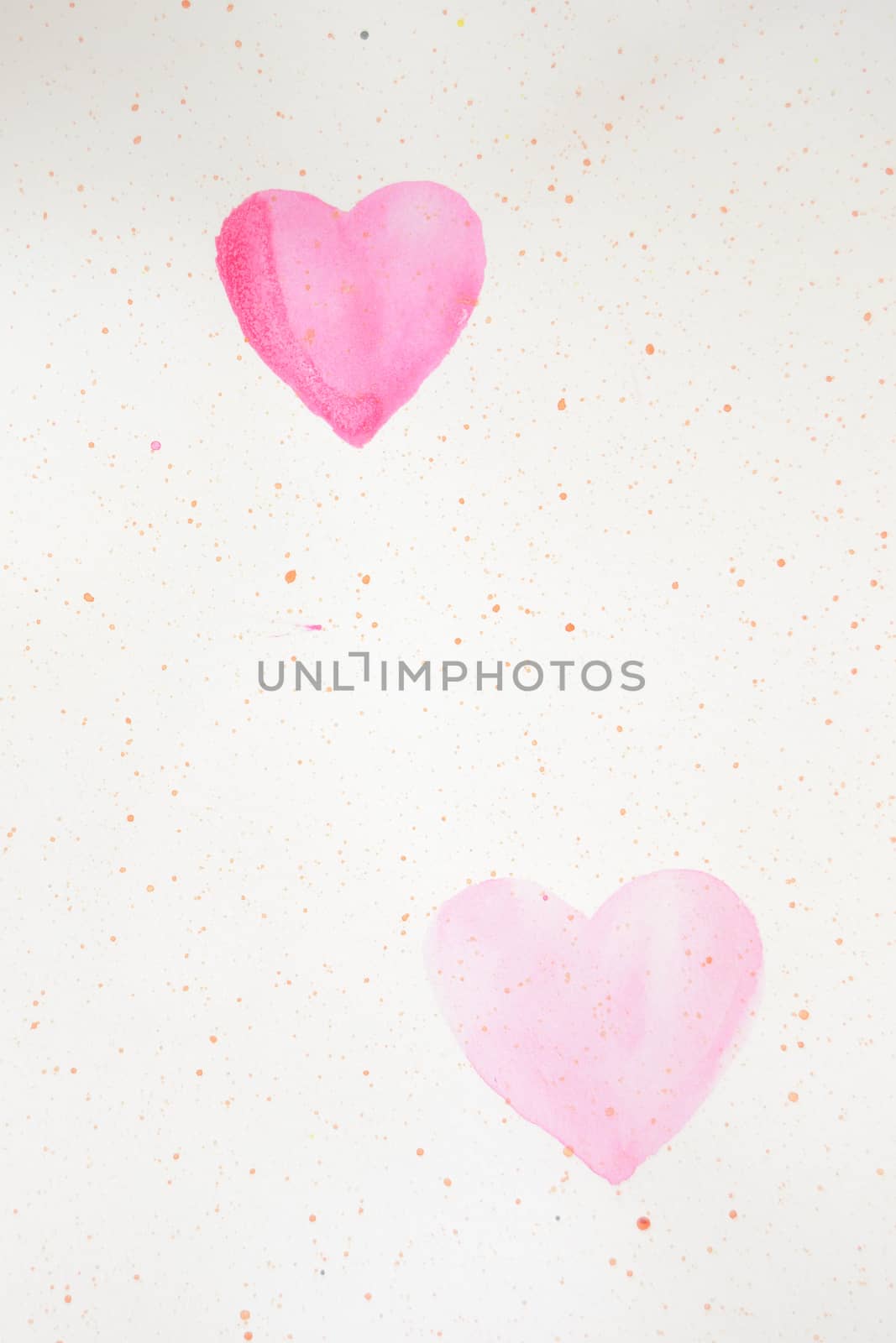 two painted pink hearts on a paper by ncuisinier