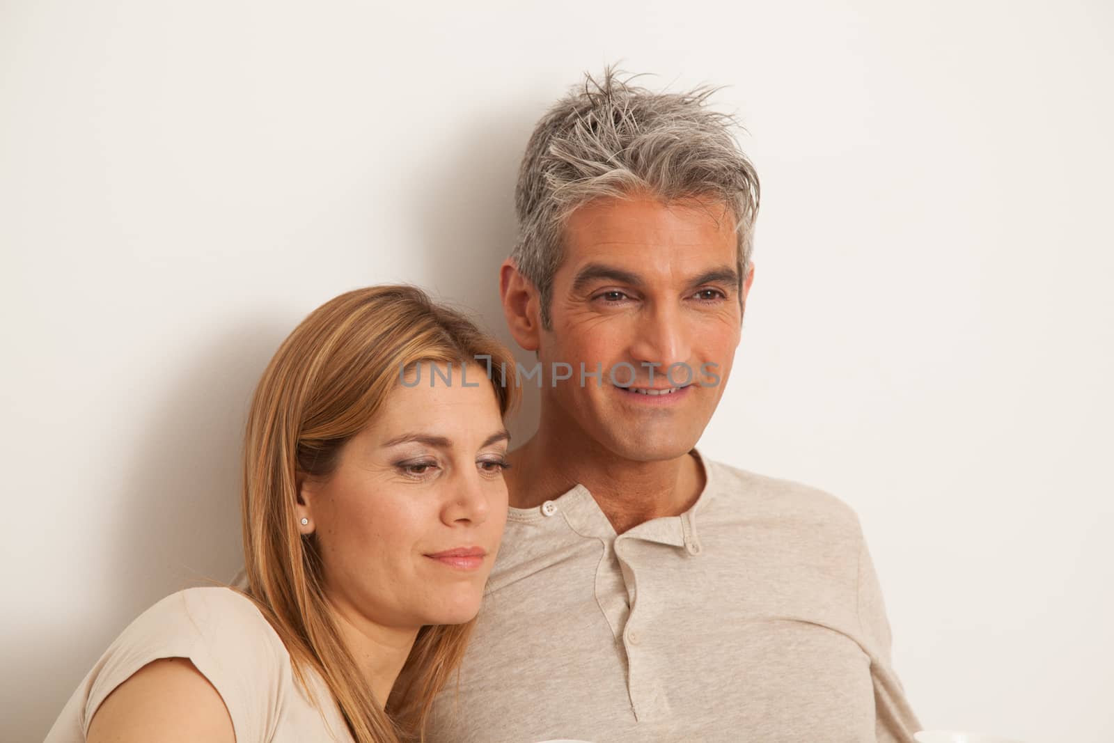 25-30, adult, apartment, attractive, bed, bedroom, caucasian, Couple, fun, handsome, happy, home, horizontal, house, leisure, lifestyle, love, marriage, men, model, nightwear, old, people, person, property, releases, sitting, smile, two, women, years, young