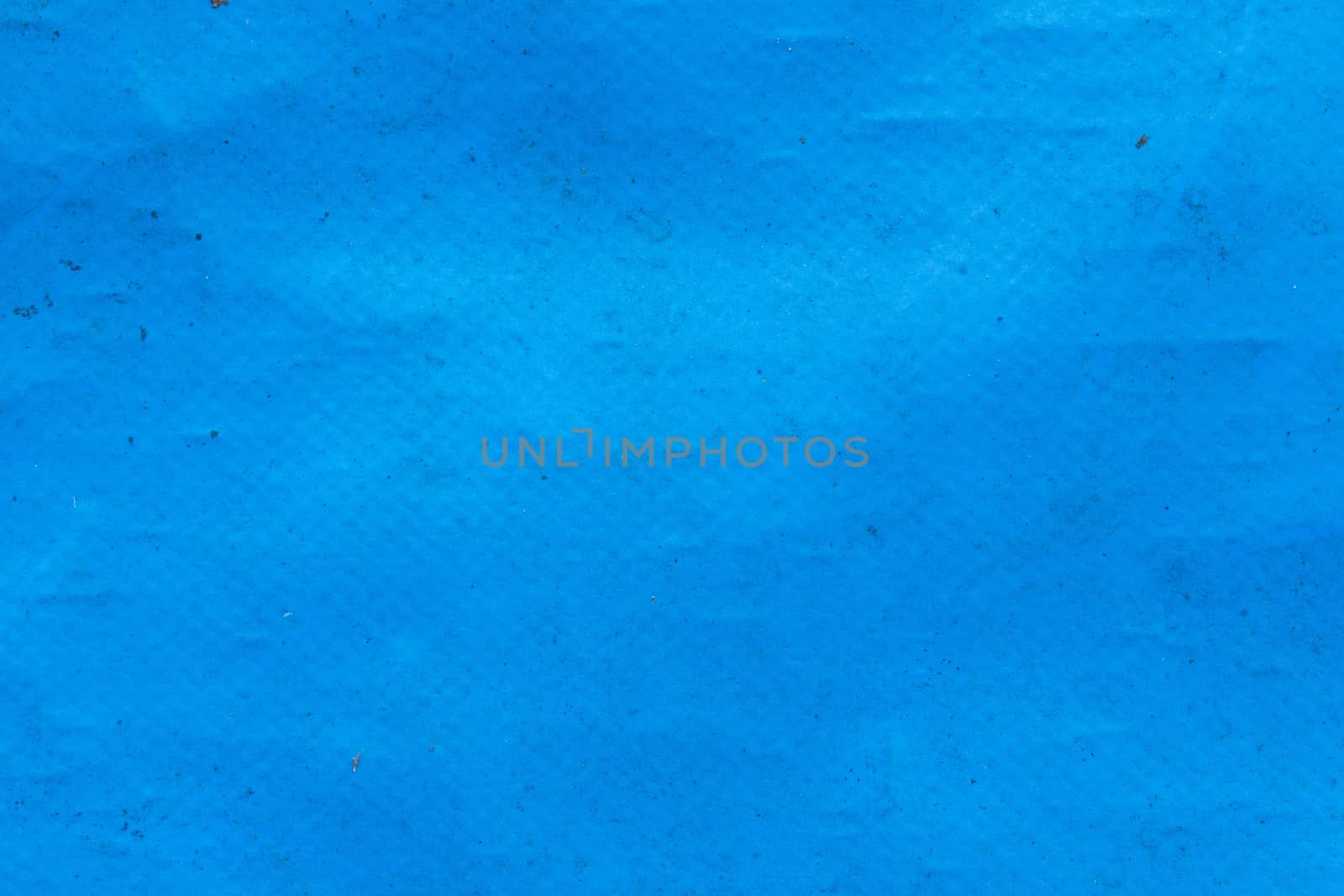 old blue plastic sunblind background with dust 