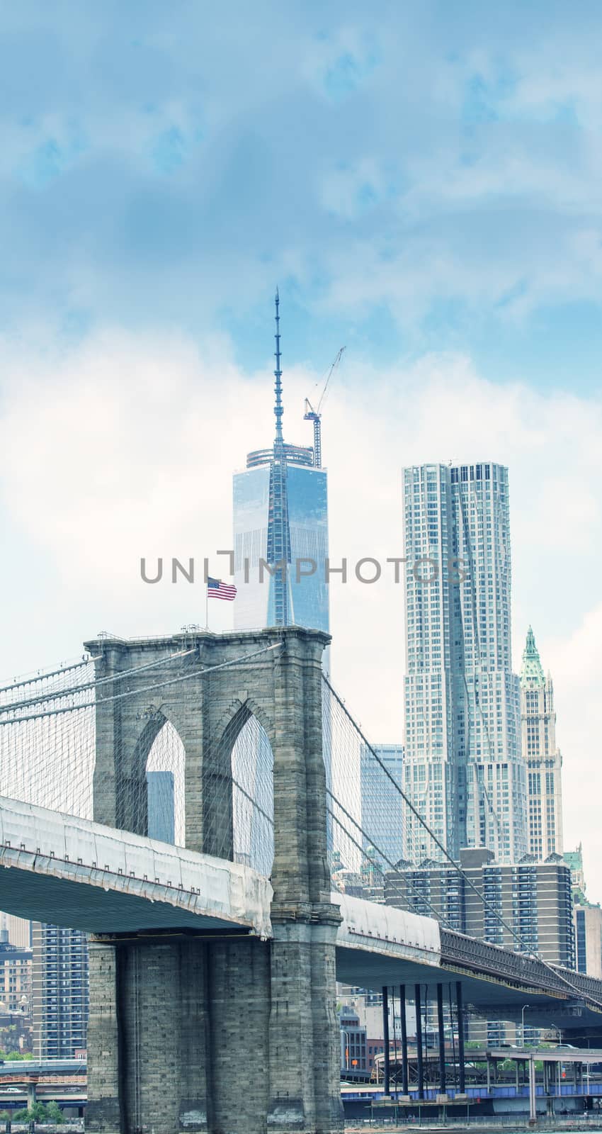 Brooklyn Bridge with Downtown Manhattan skyline.