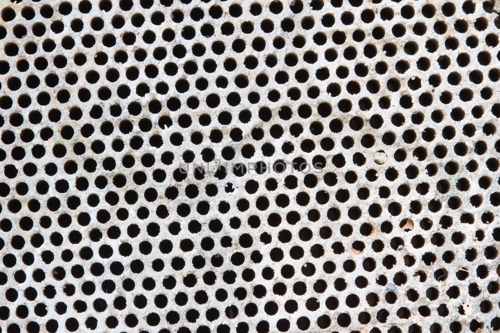 dot pattern of baked clay mesh filter.