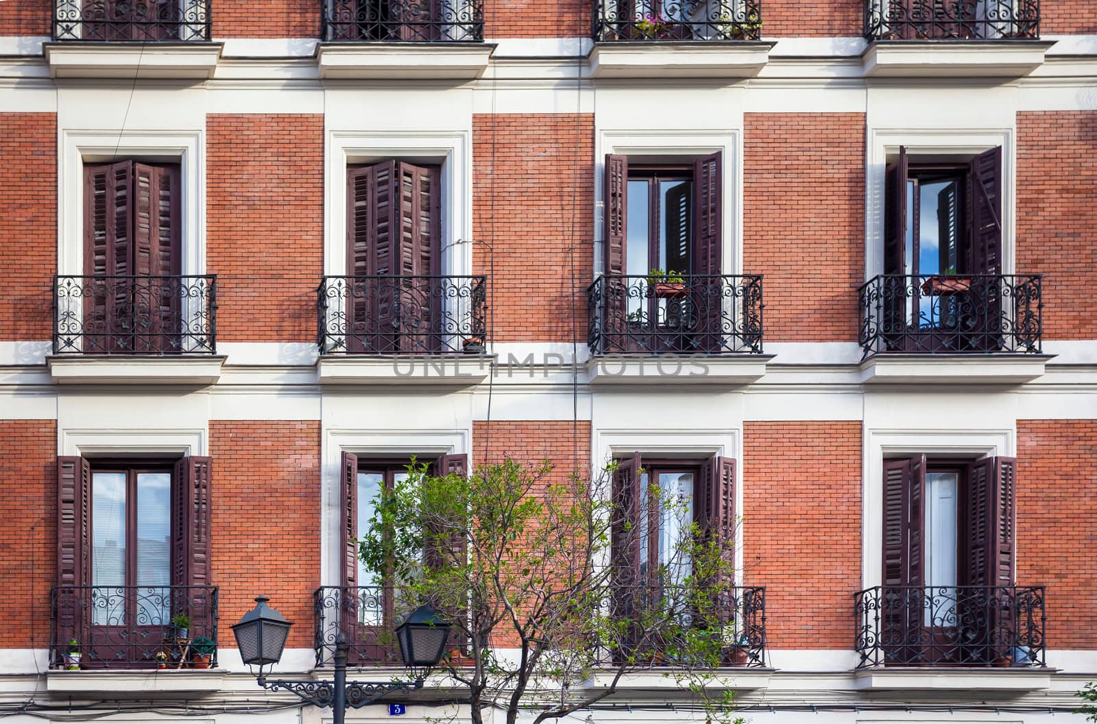 Madrid, Spain - May 6, 2012: Typical building facade on a spring day in Madrid, Spain