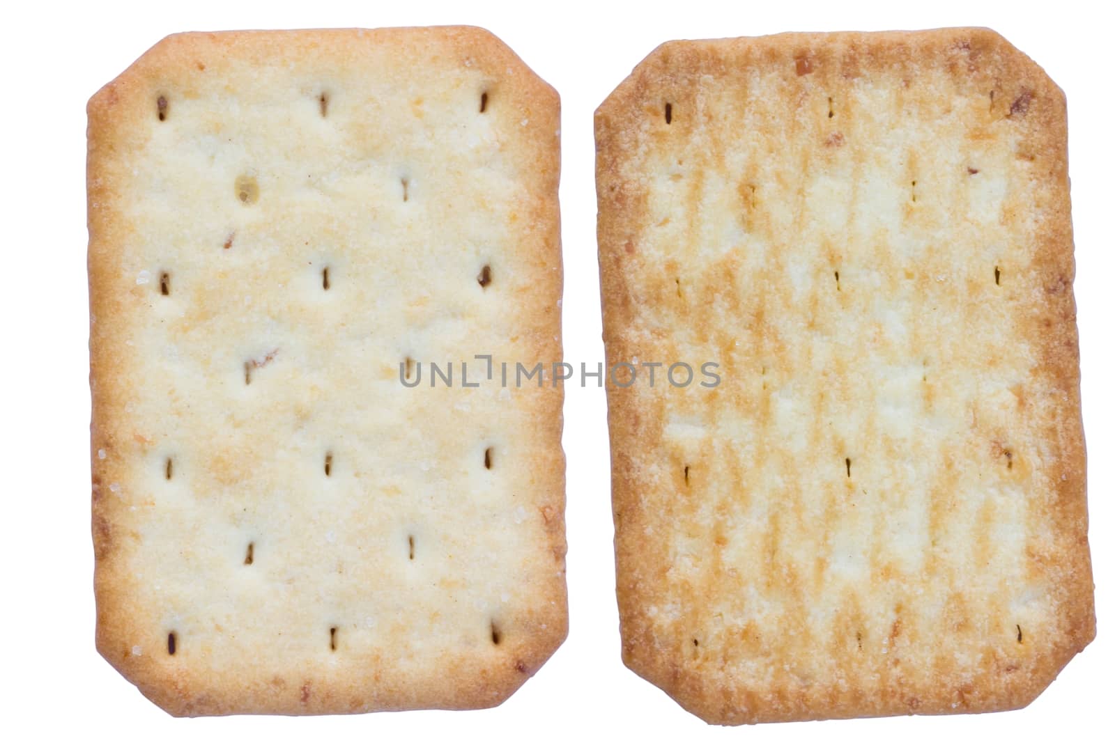 Saltine soda crackers isolated on white background, front and back side.