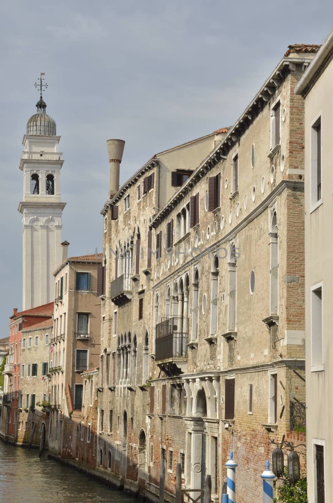 Leaning tower  in canal of Venice, Italy.