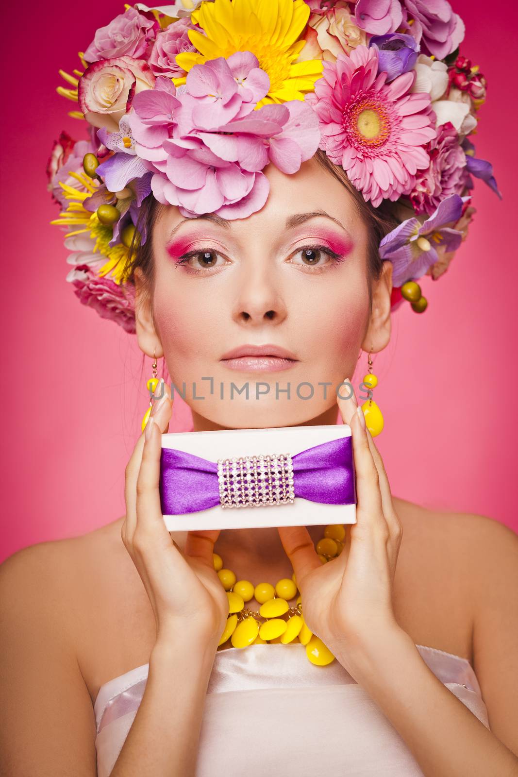 Woman with gift box and flowers hair by Kor