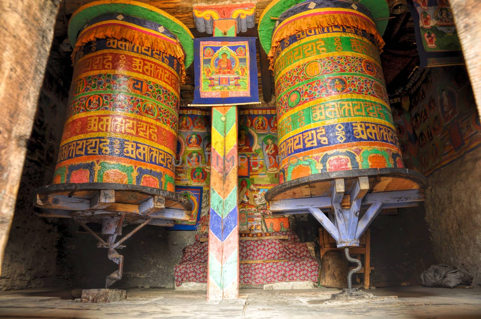 Colorful buddhist prayer wheels in Nepal