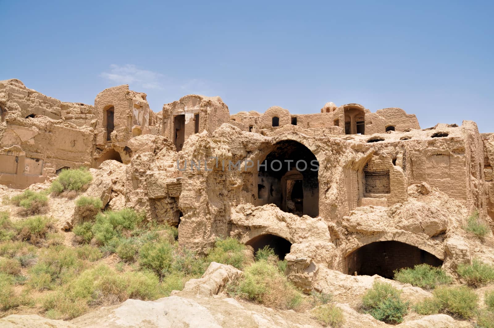 Ruins of old houses in village of Kharanaq in Iran