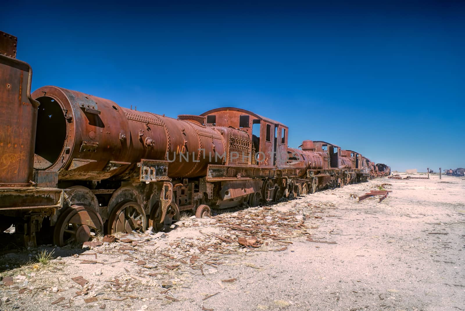 Old locomotive graveyard in desert near Salar de Uyuni in Bolivia          