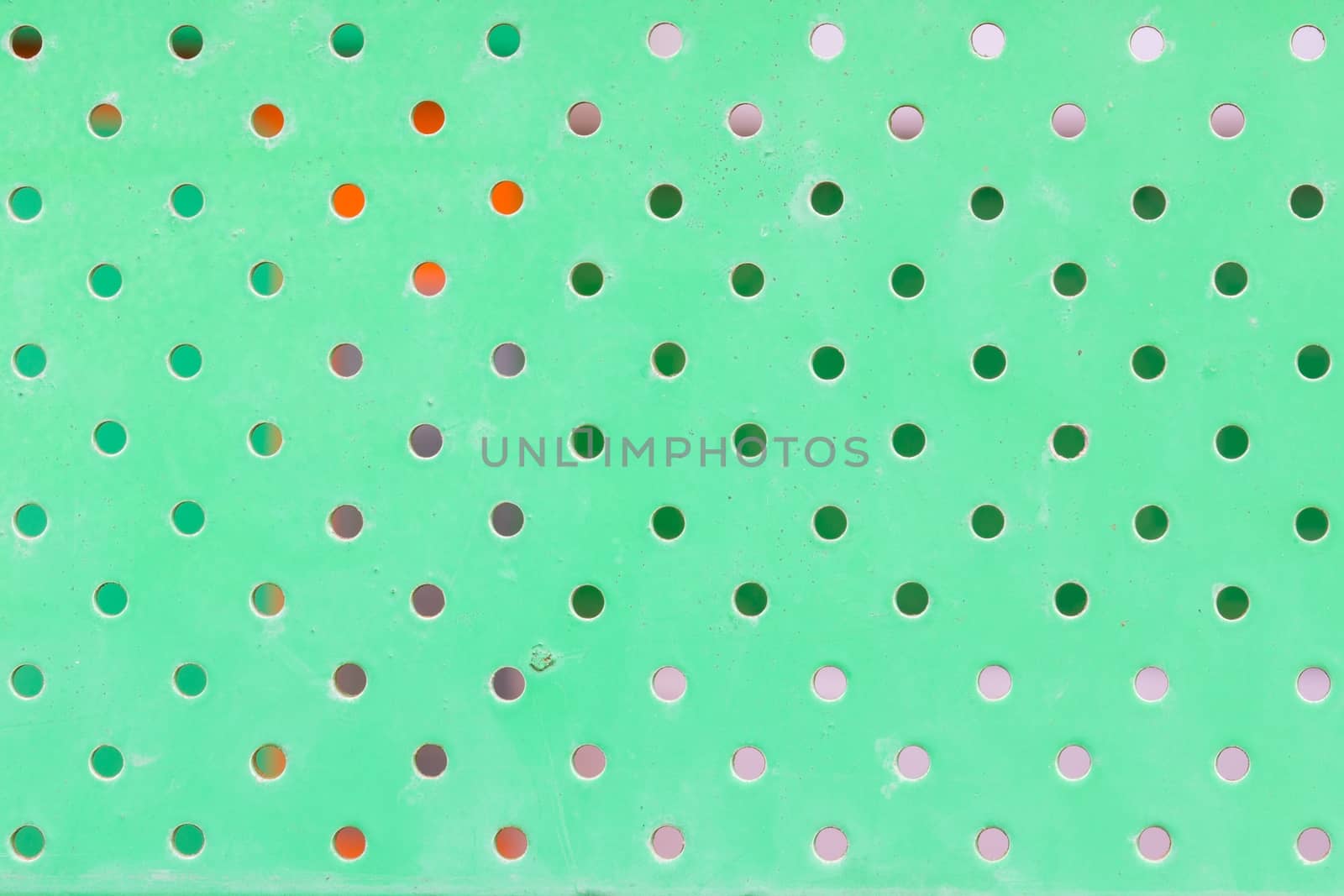 texture of dirty green metal with holes.