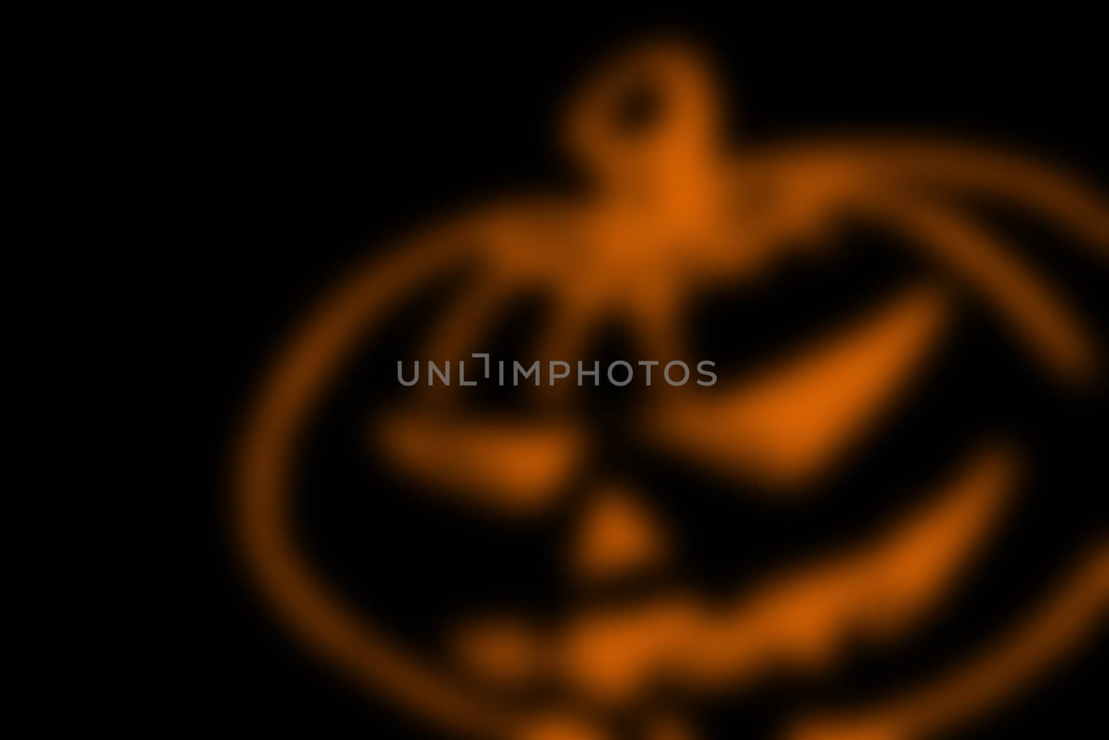 abstract black background with blurred orange line, for halloween. copyspace on the left