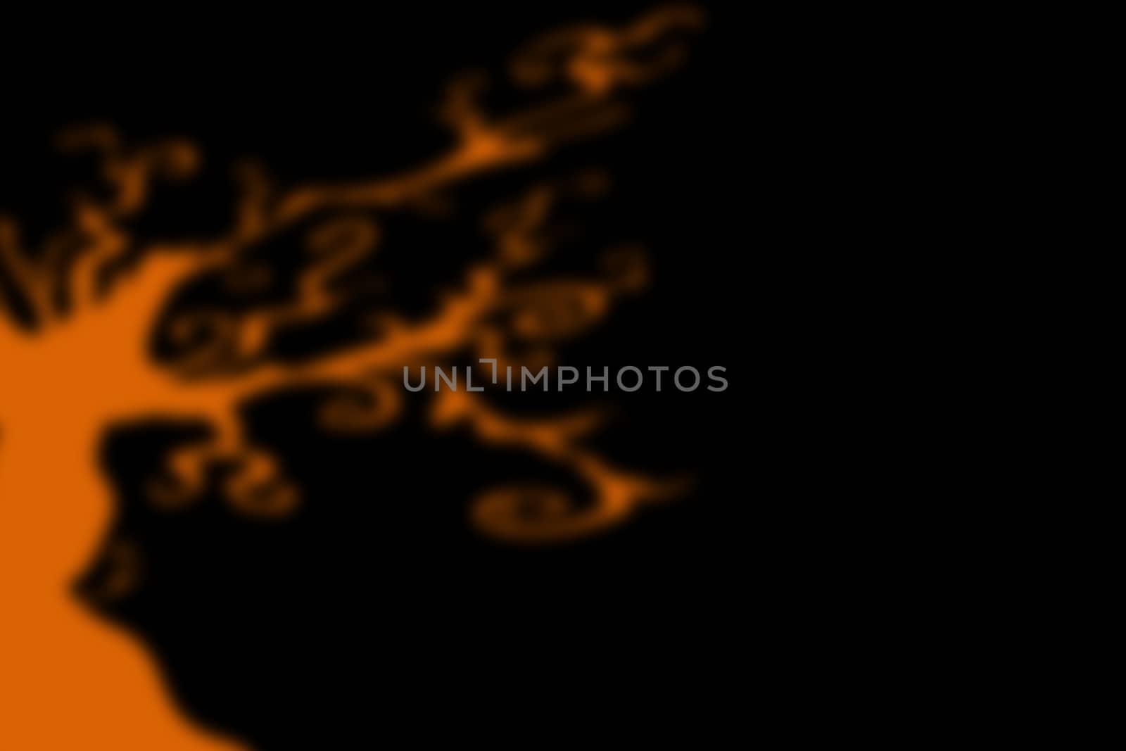 abstract black background with blurred orange line, for halloween. copyspace on the right