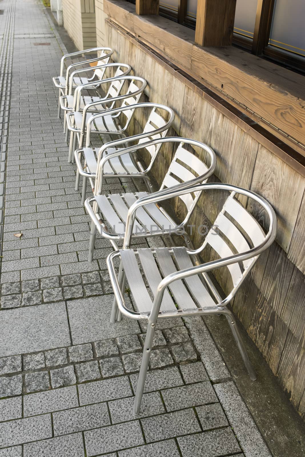 Many chairs for waiting others shopping beside the store outdoor