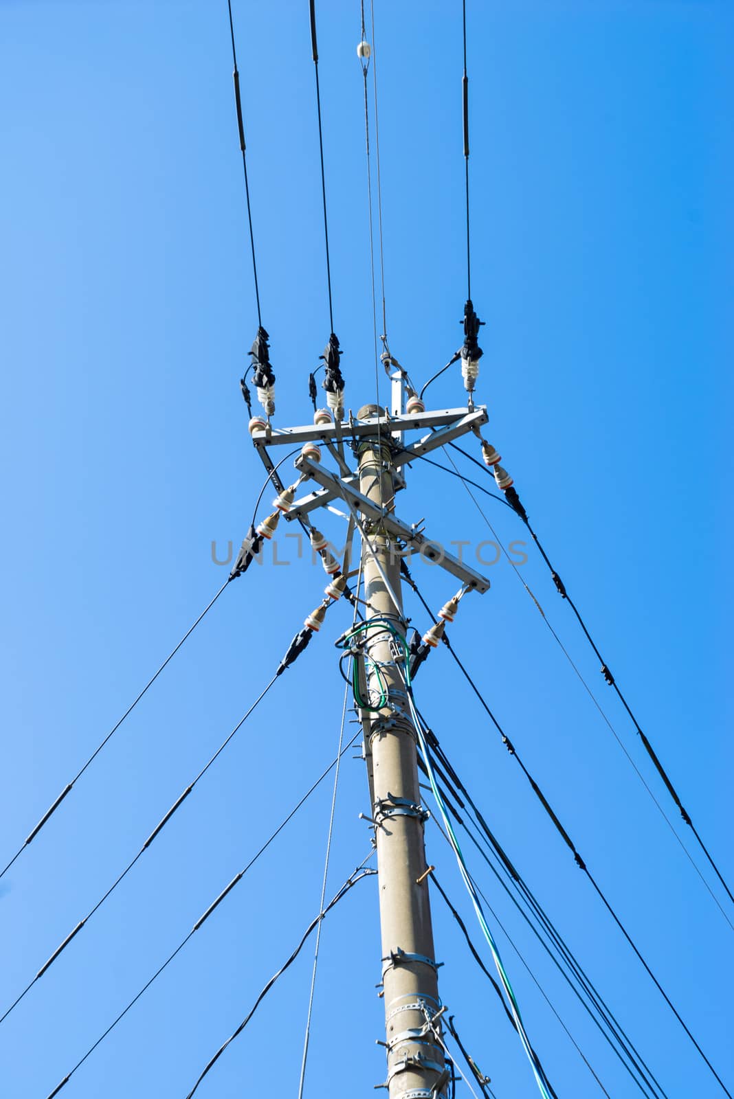 Electricity post in japan split to 3 ways with clear sky background