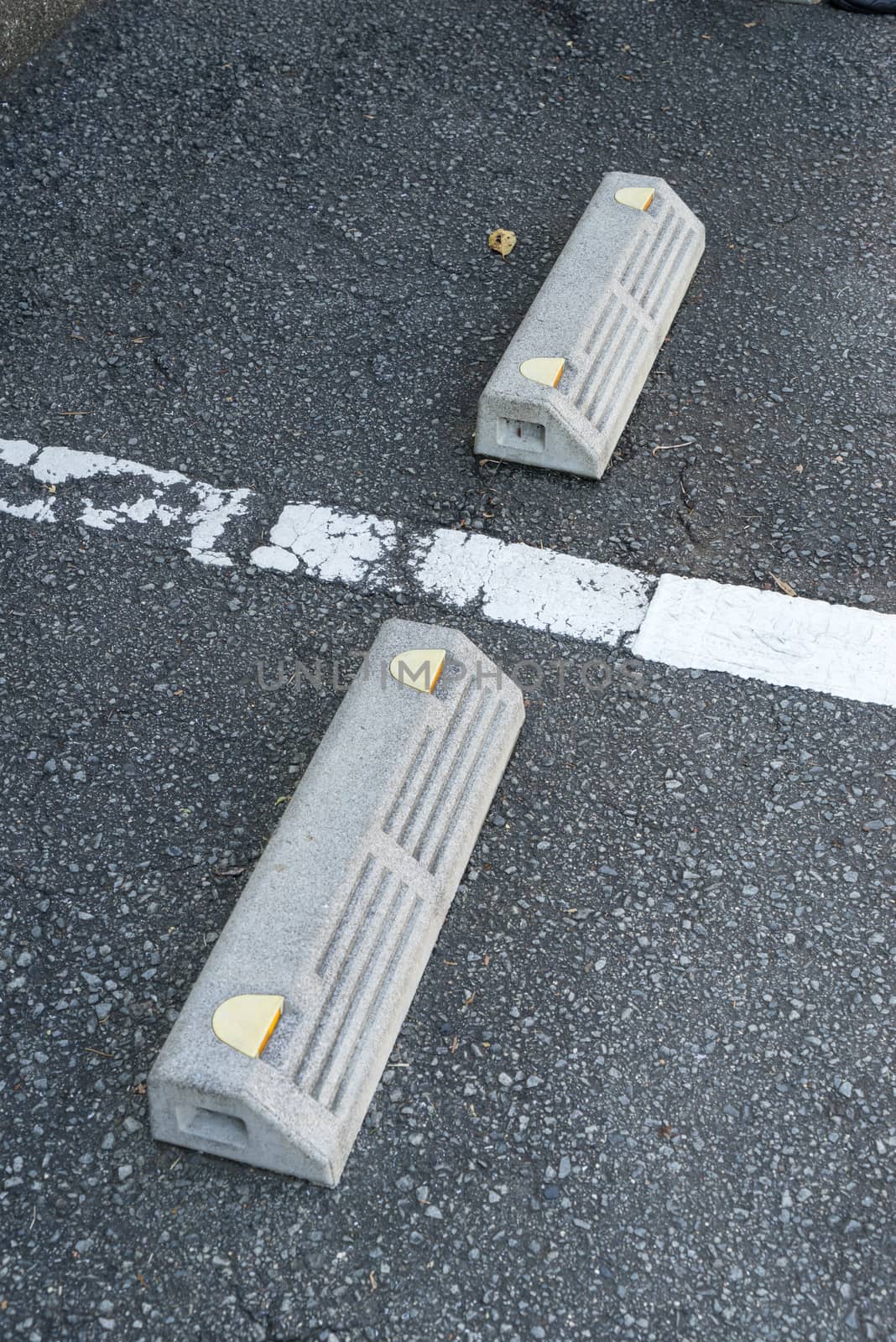 Skid on the parking lot to protect a car to move accidently